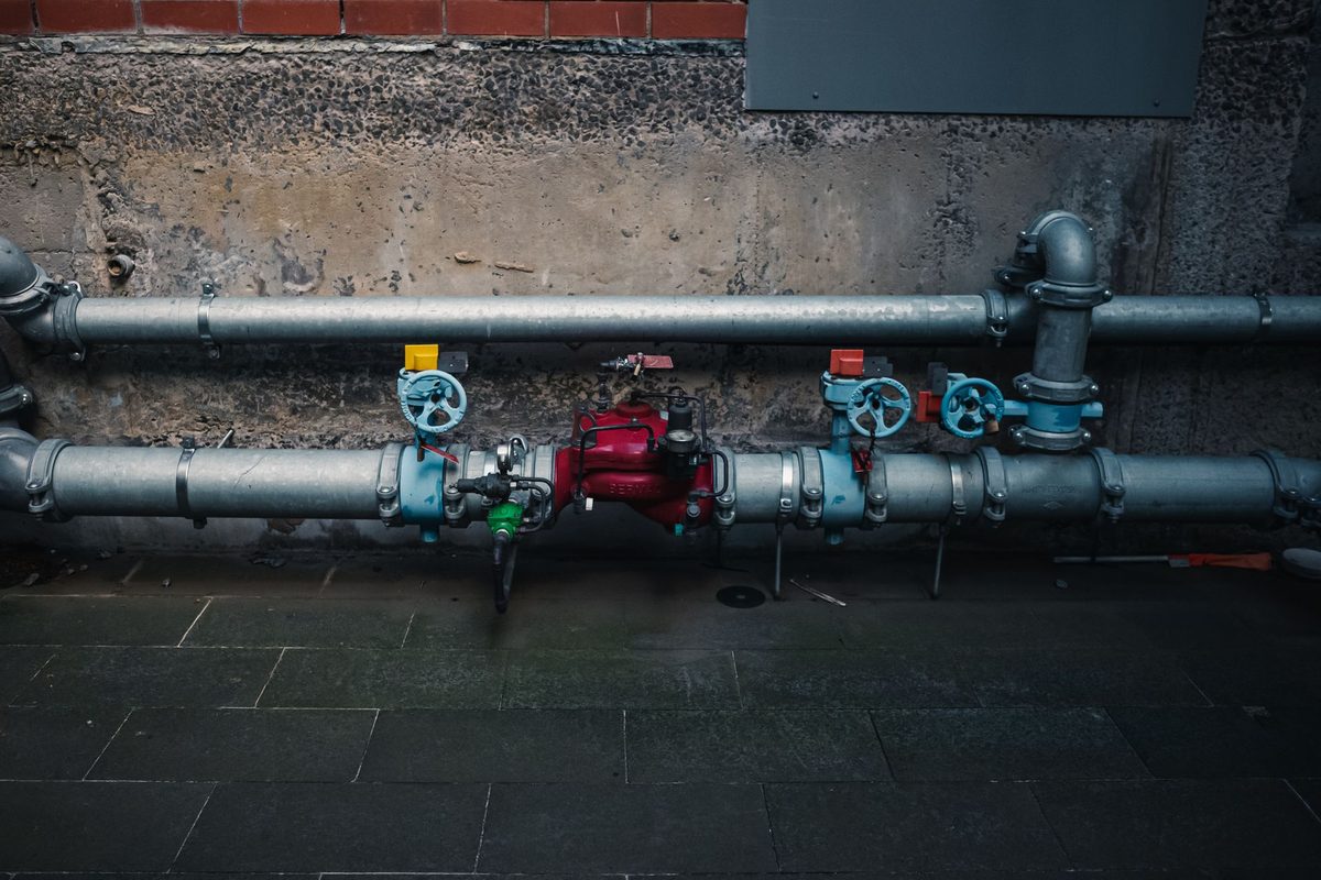 Bank of pipes with colored valve handles